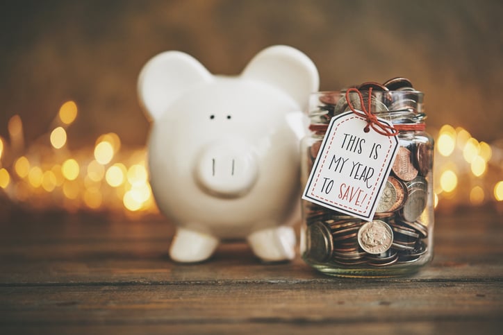 money resolutions piggy bank with new year saving jar
