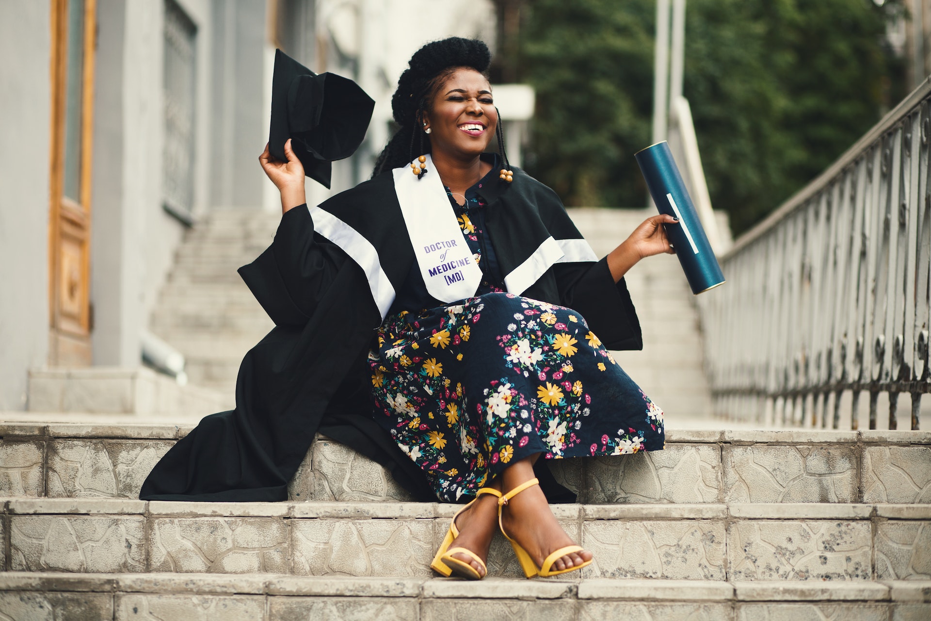 Woman with graduation cap and diploma 