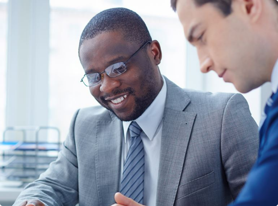 businessmen collaborating and smiling