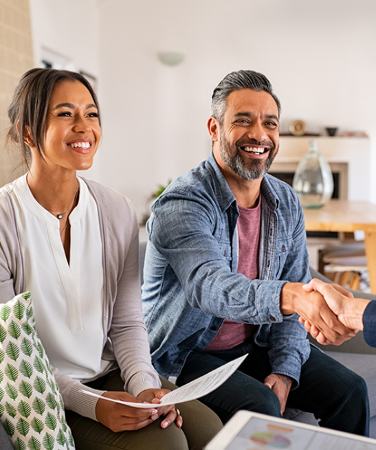 mortgage-contact-us Couple shaking hands with other